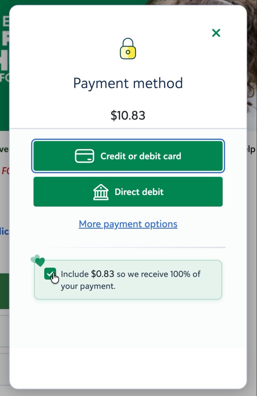 Payment method pop-up showing Credit or debit card, Direct debit, a More payment options link and the pre-checked fee coverage box